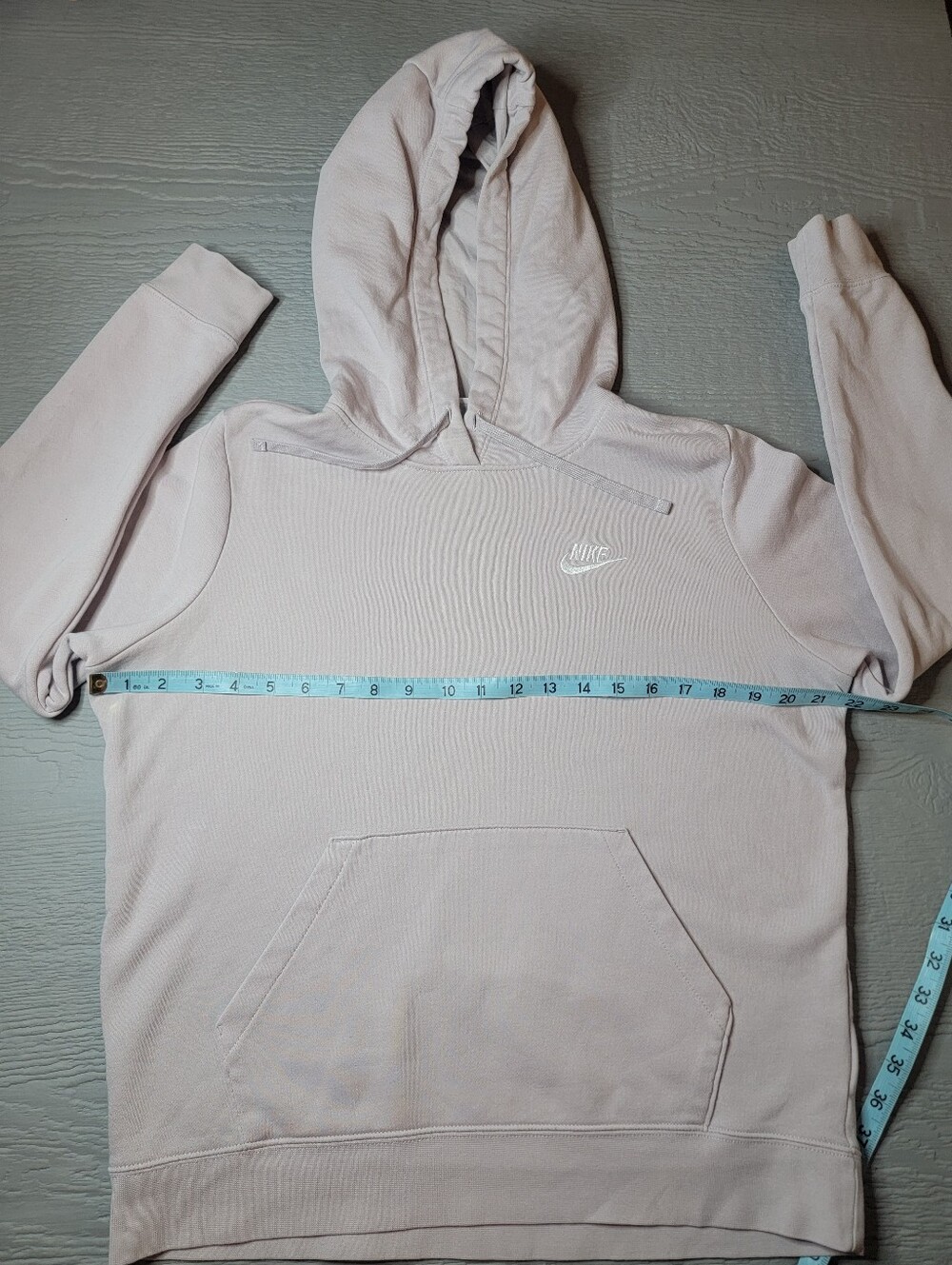 Nike womens Pale Pink Pullover Hoodie with White Swoosh